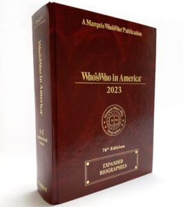 Who's Who in America 2023 edition. Big red book. Marquis Who's Who history. What is Marquis Who's Who